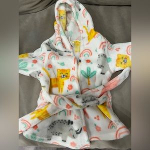 Fluffy rainbow infant robe.